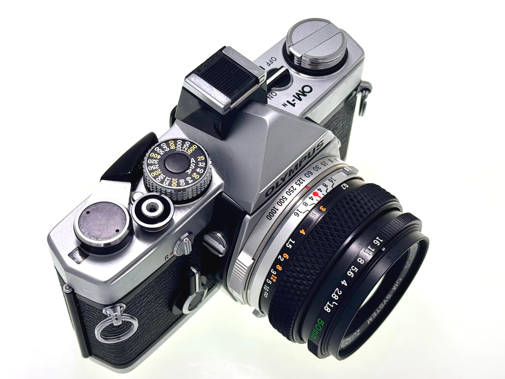 Vintage Olympus OM-1n with 50mm Zuiko F1.8 Lens and Hotshoe 4. (Vg)