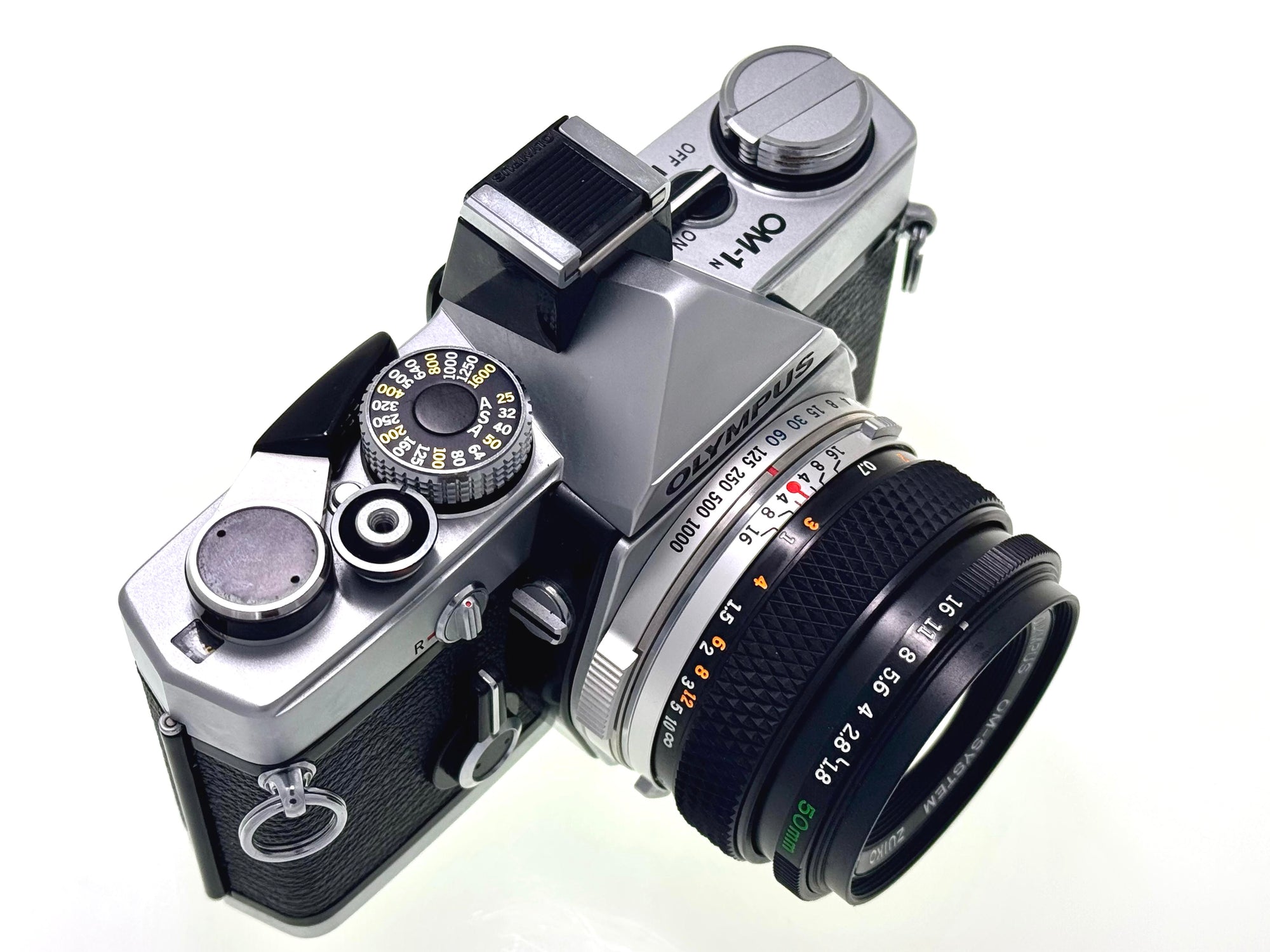 Vintage Olympus OM-1n with 50mm Zuiko F1.8 Lens and Hotshoe 4. (Vg)
