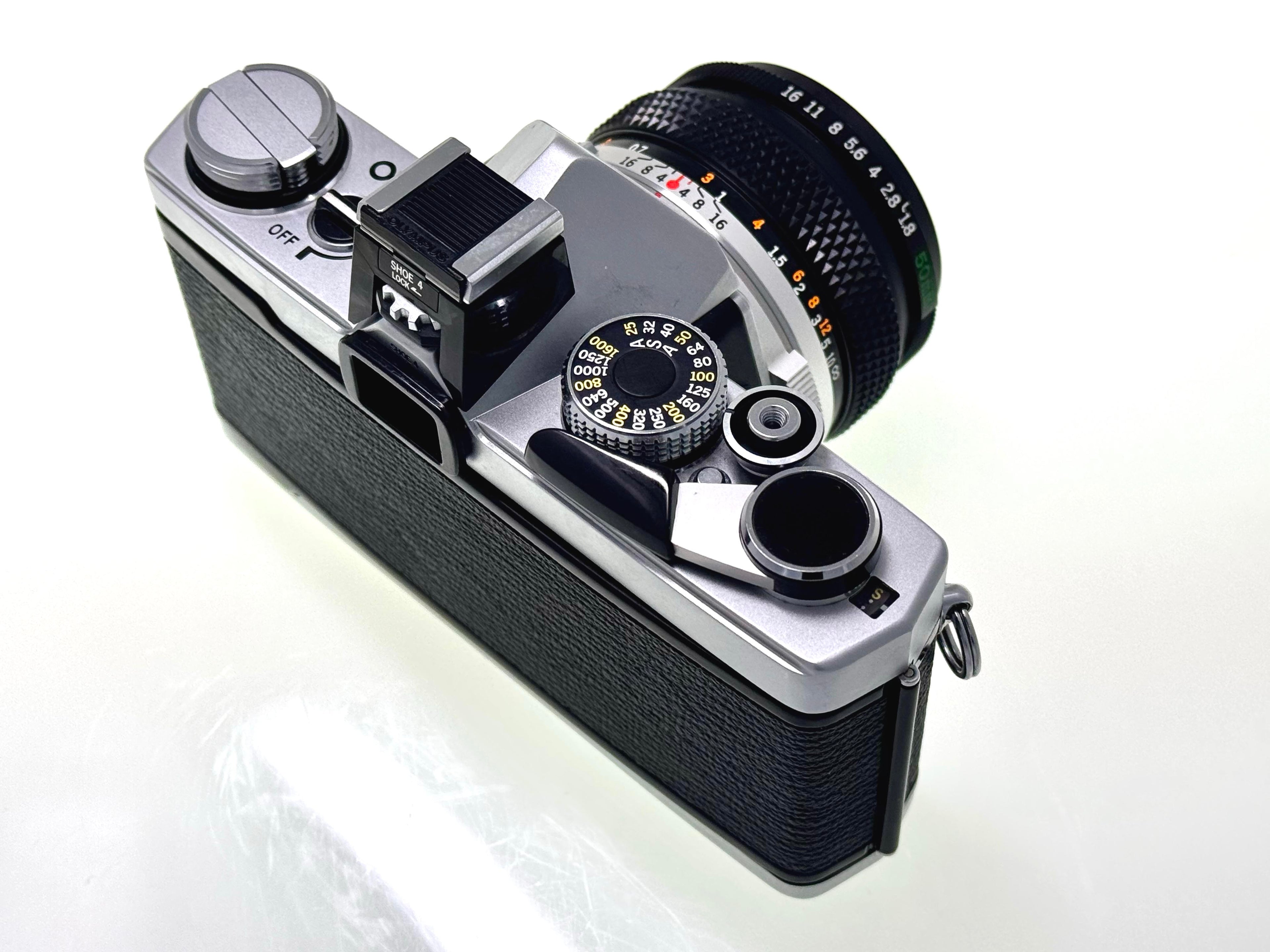 Vintage Olympus OM-1n with 50mm Zuiko F1.8 Lens and Hotshoe 4. (Vg)