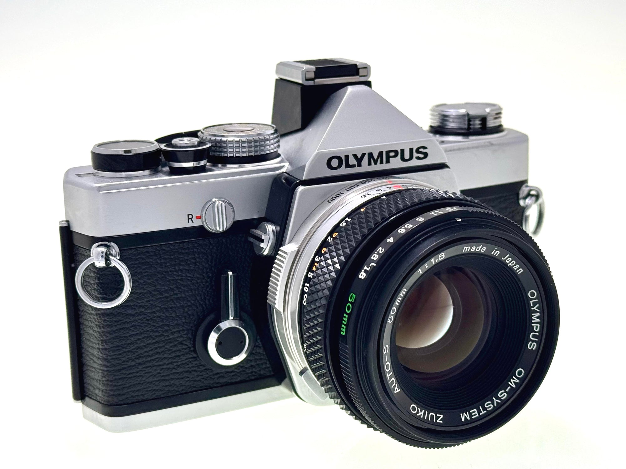 Vintage Olympus OM-1n with 50mm Zuiko F1.8 Lens and Hotshoe 4. (Vg)