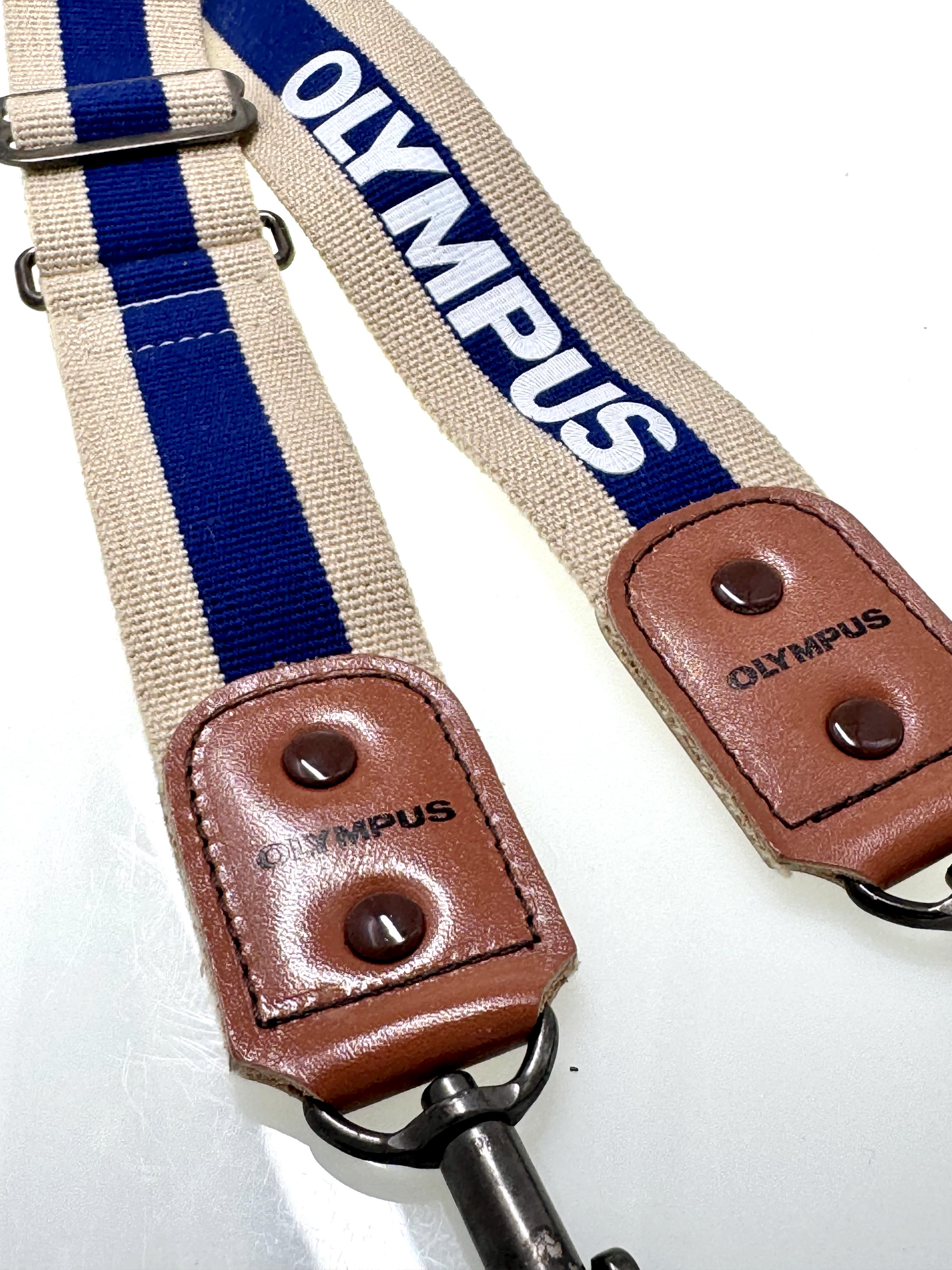 Olympus Hunter Camera strap on a white background