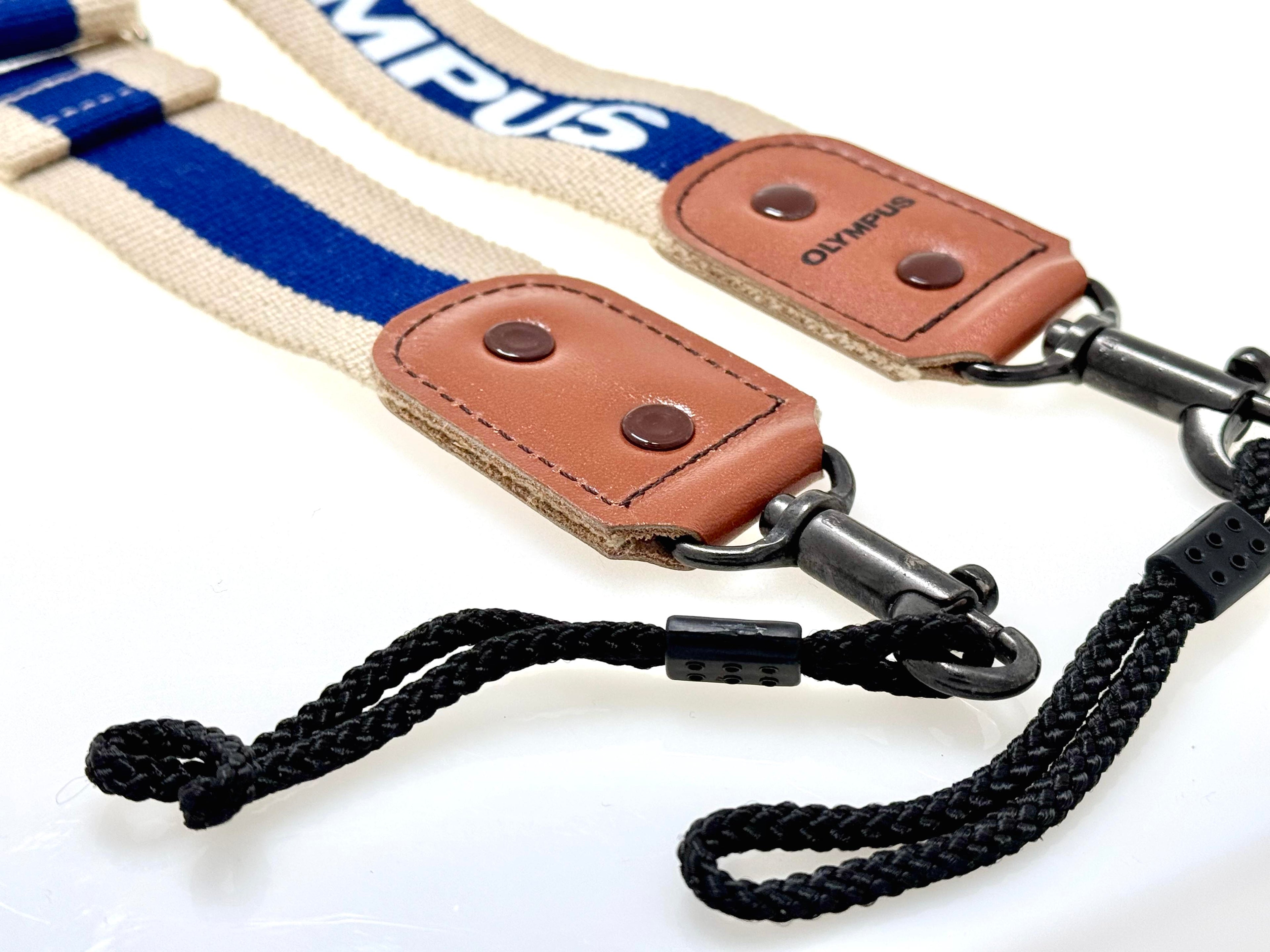 Olympus Hunter Camera strap on a white background