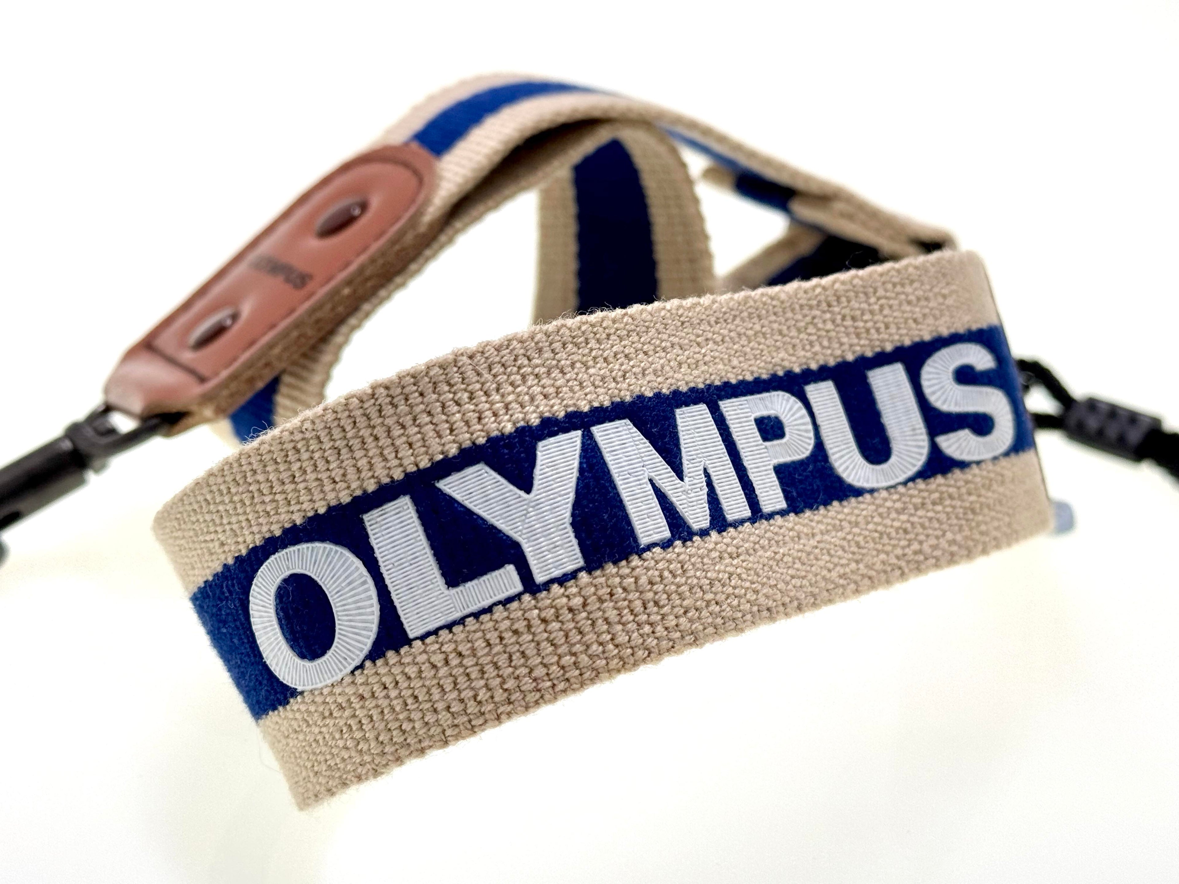 Olympus Hunter Camera strap on a white background
