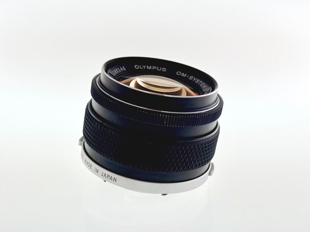 Vintage Olympus 50mm F1.4 'Silver Nose' Lens. (Vg)