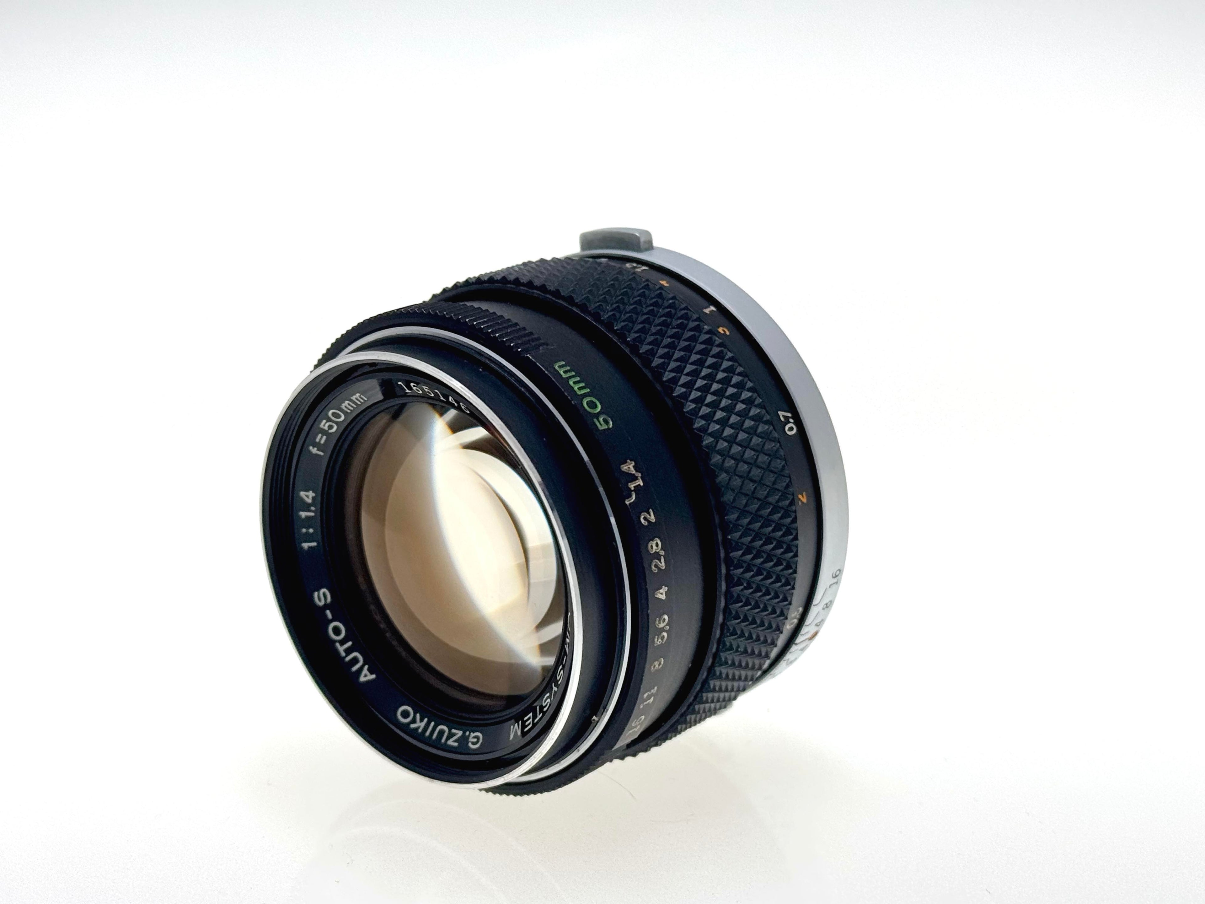 Vintage Olympus 50mm F1.4 'Silver Nose' Lens. (Vg)