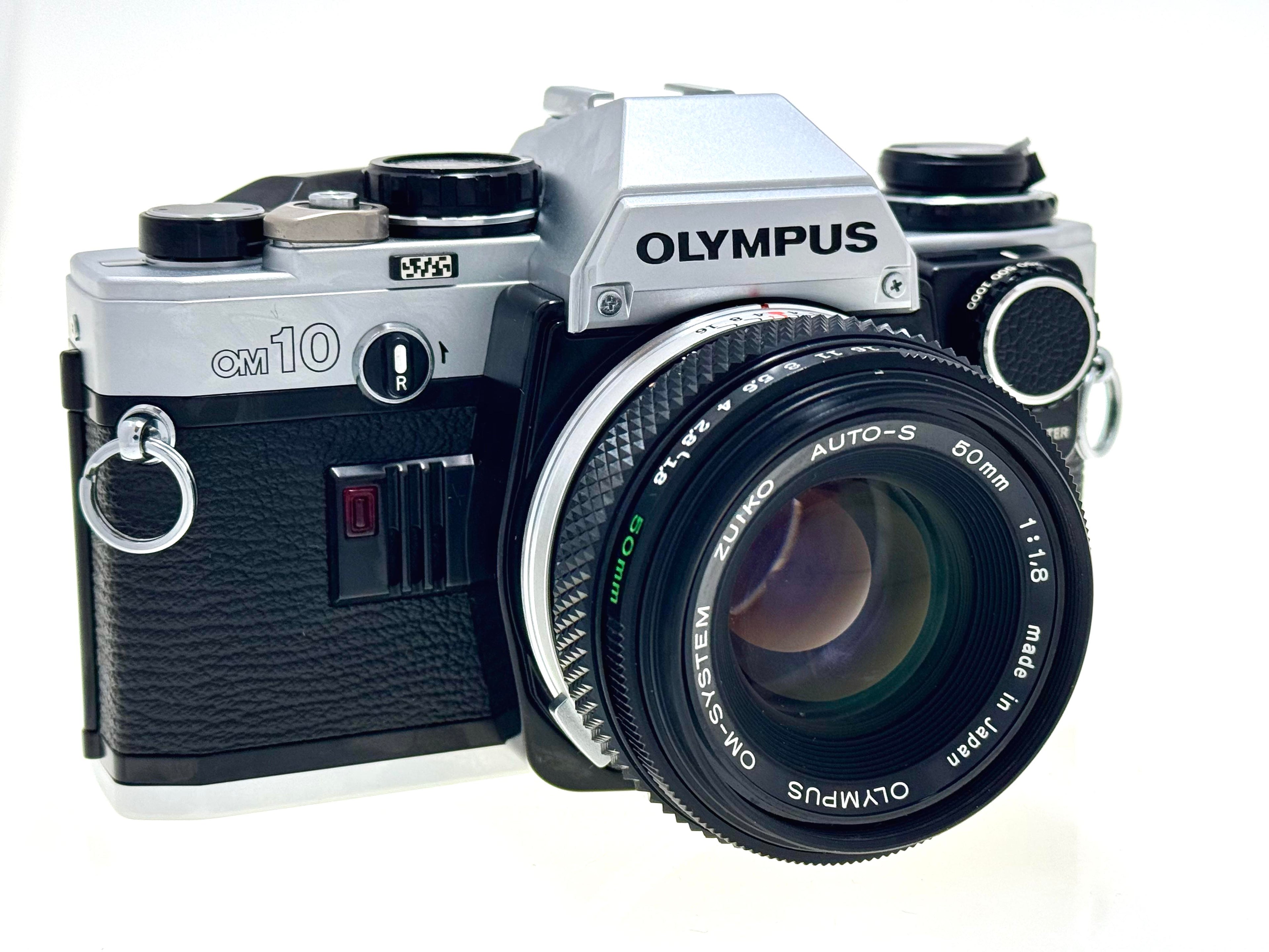 Vintage Olympus OM10 with 50mm Zuiko F1.8 Lens and Manual Adapter. (Exc)