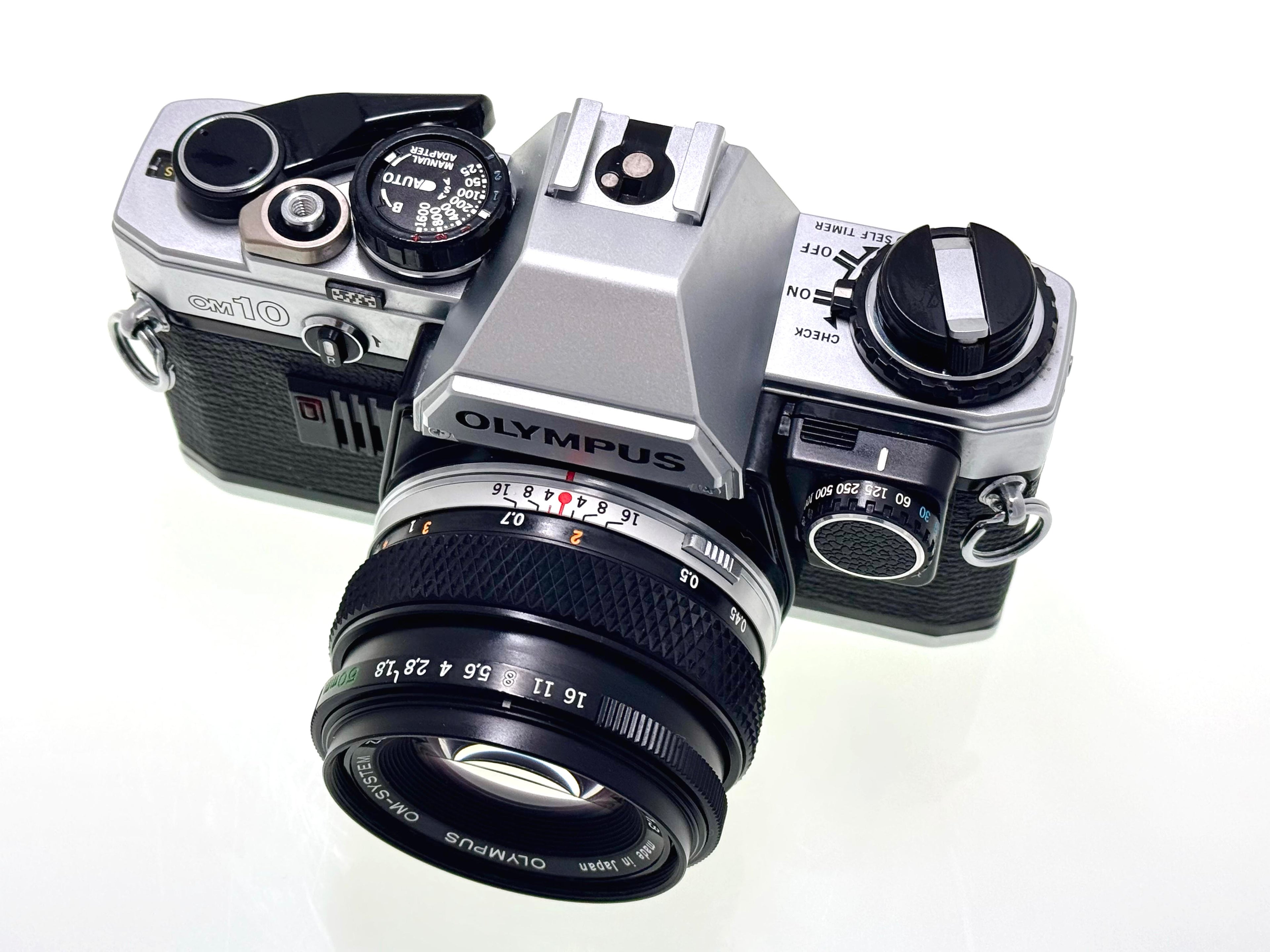 Vintage Olympus OM10 with 50mm Zuiko F1.8 Lens and Manual Adapter. (Exc)