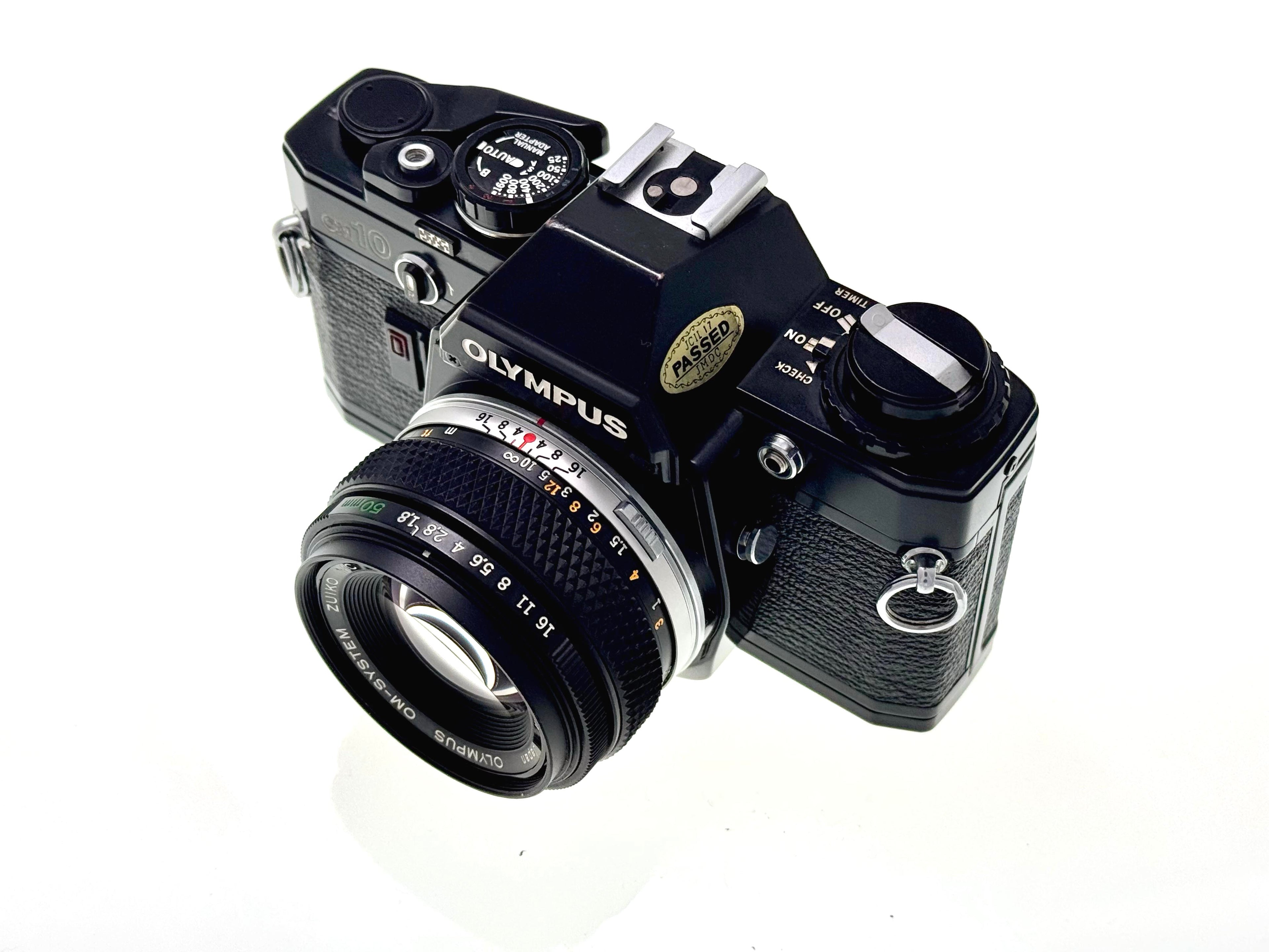 Vintage Olympus OM10 Black with 50mm Zuiko F1.8 Lens. (Exc)