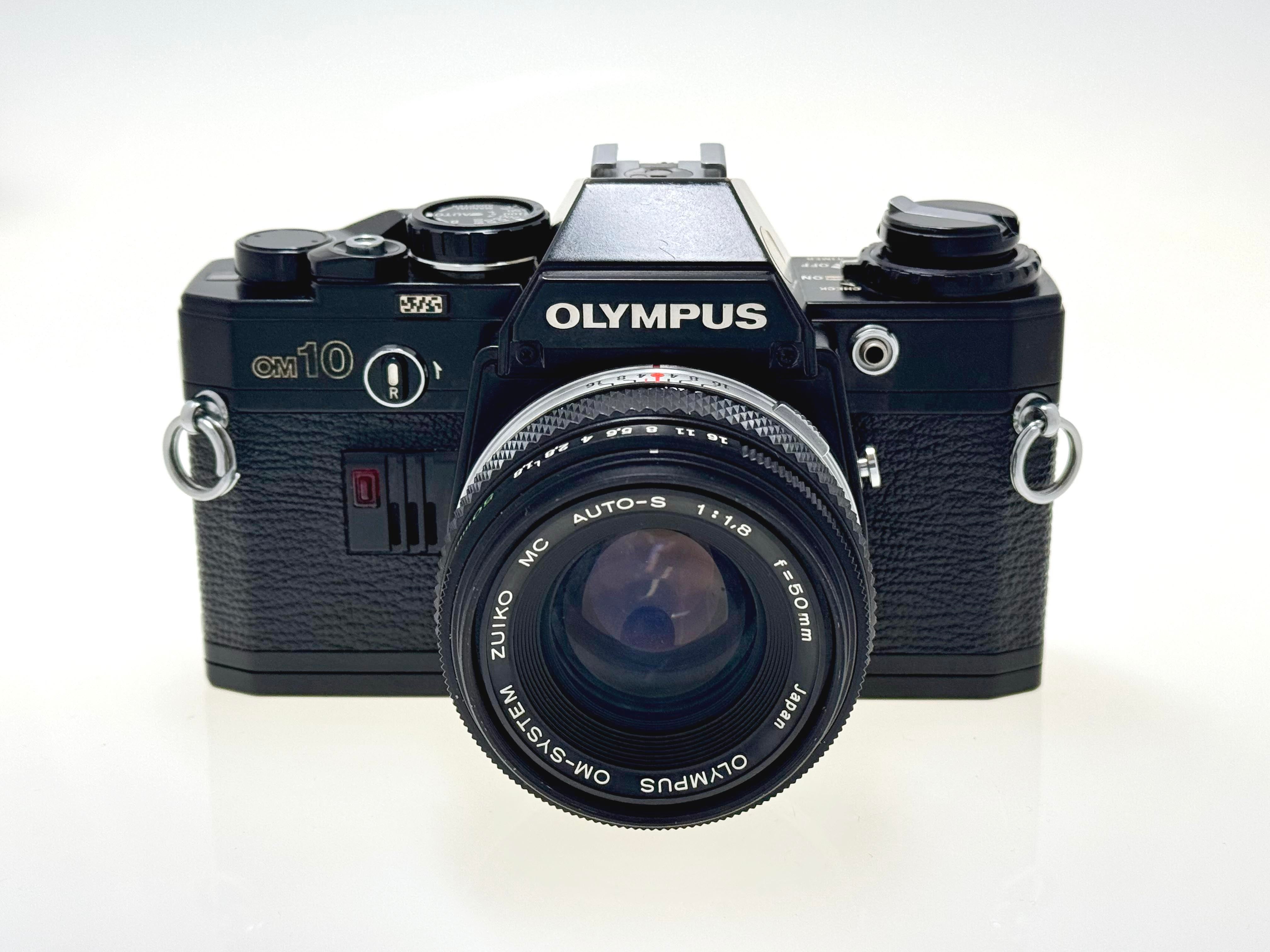 Vintage Olympus OM10 Black with 50mm Zuiko F1.8 Lens. (Exc)