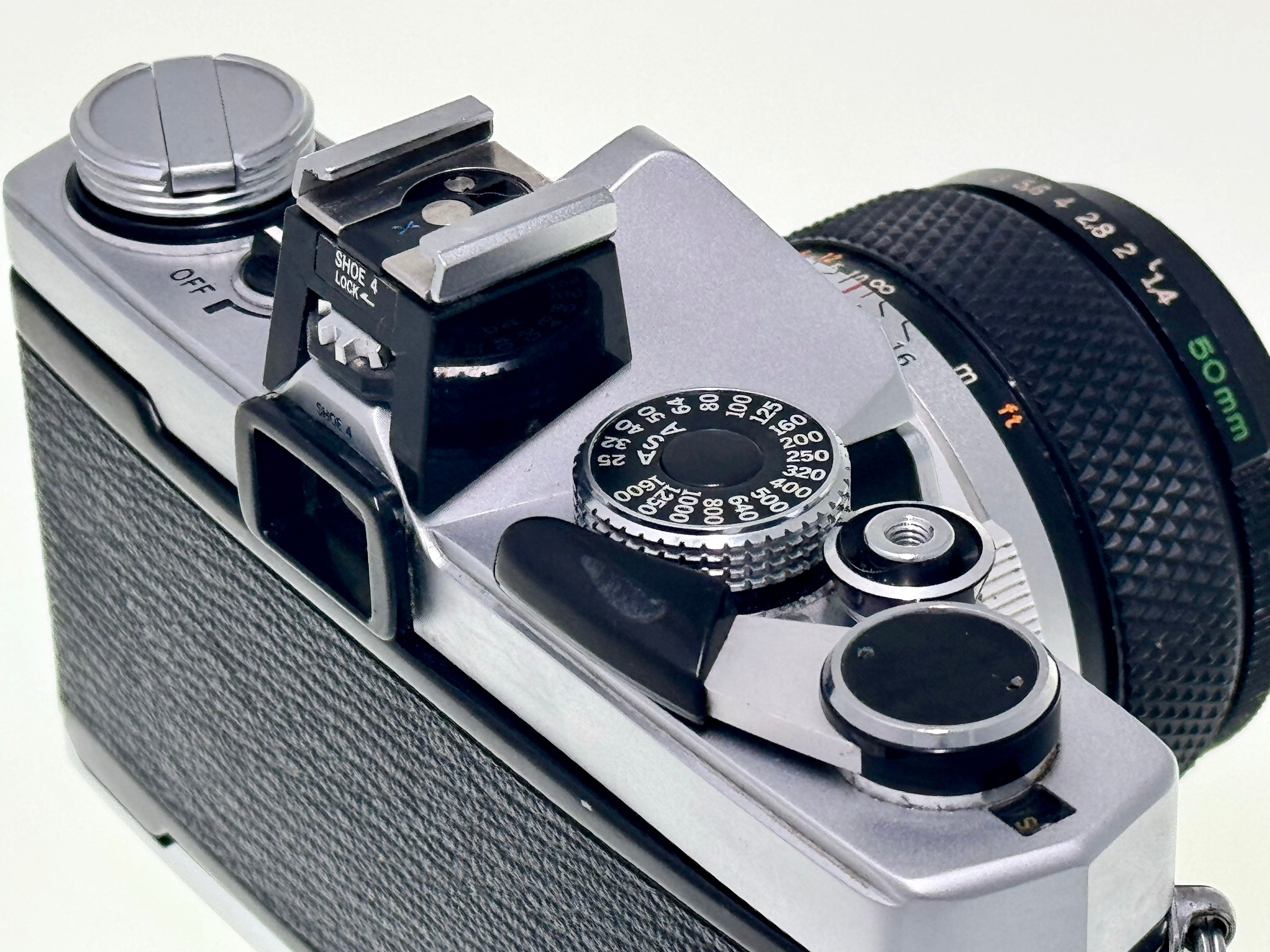 Vintage Olympus OM-1n with 50mm F1.4 Silver nose Lens (Vg)