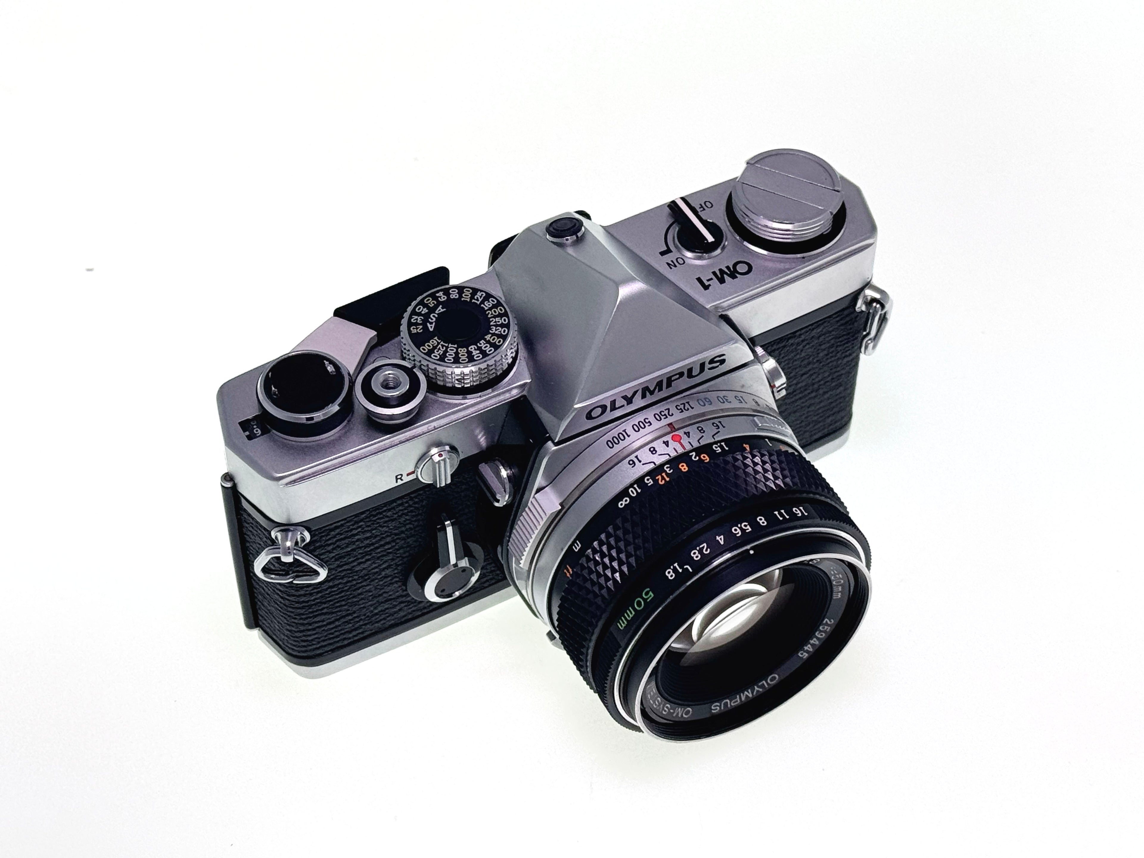 Vintage Olympus OM-1 with 50mm F1.8 Silver nose Lens (Exc)
