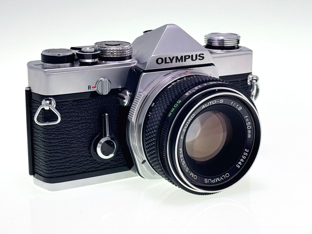 Vintage Olympus OM-1 with 50mm F1.8 Silver nose Lens (Exc)