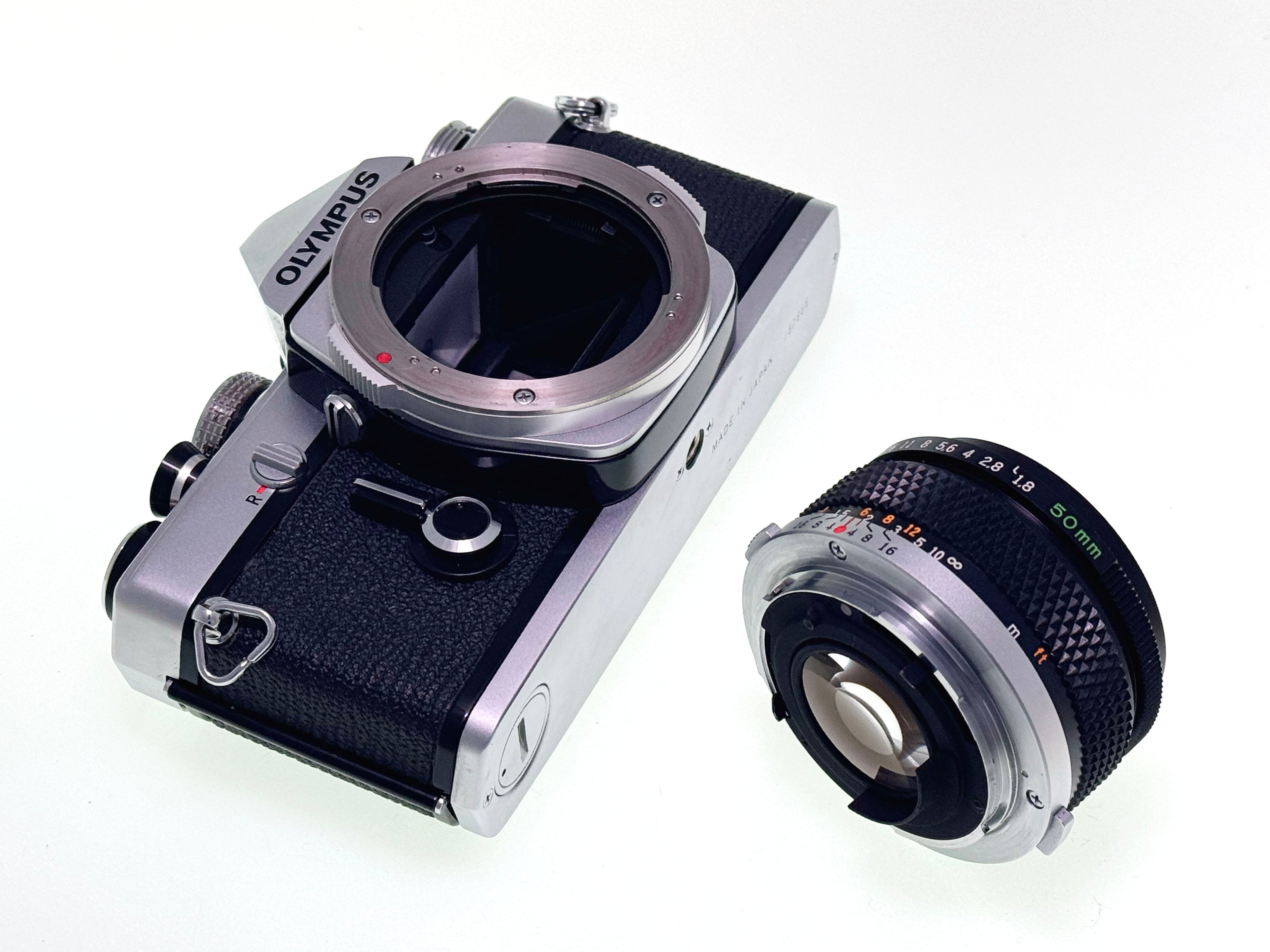 Vintage Olympus OM-1 with 50mm F1.8 Silver nose Lens (Exc)