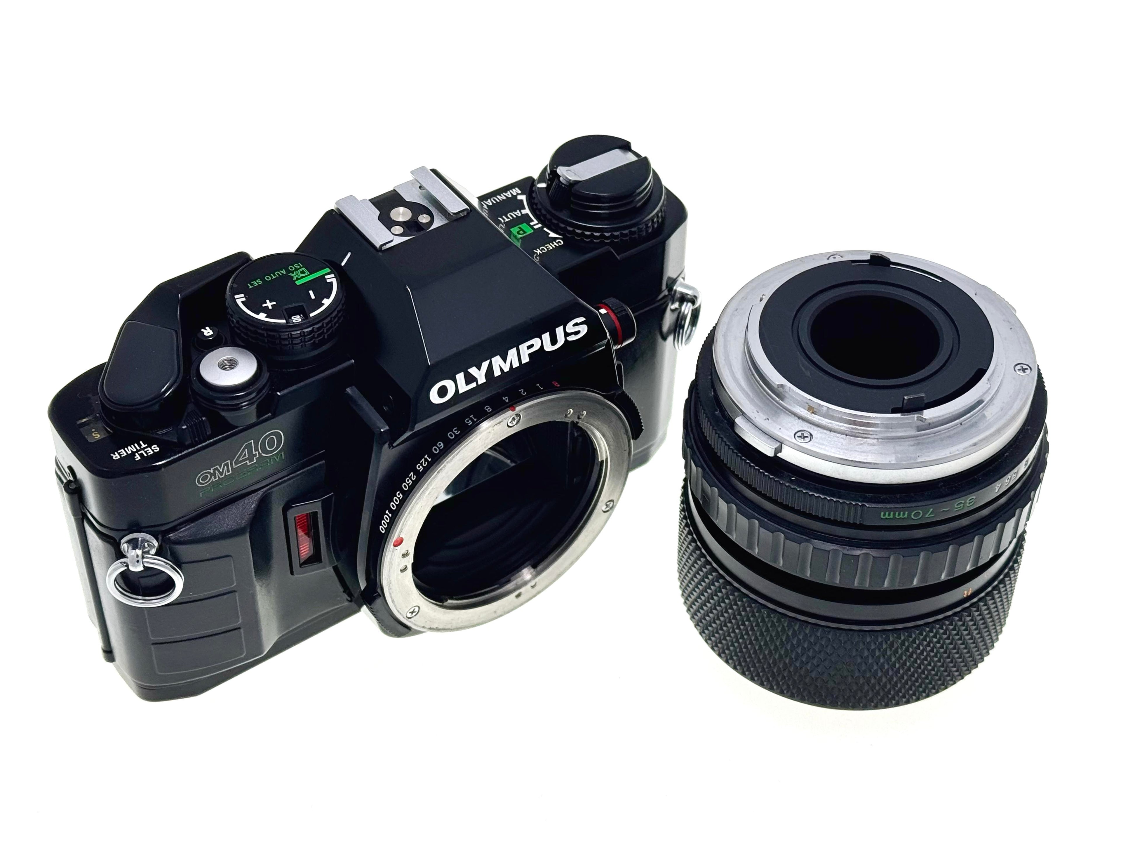 Olympus OM40 Program SLR analogue Film camera with zoom lens